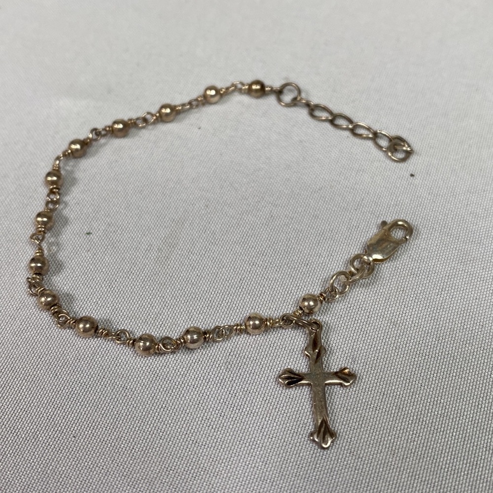 Dainty silvertone cross bracelet